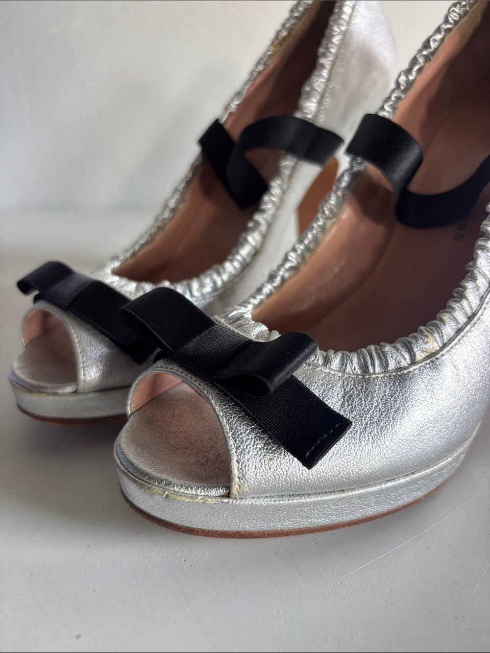 Marc Jacobs Silver Peep-Toe Heels with Black Bow Accent